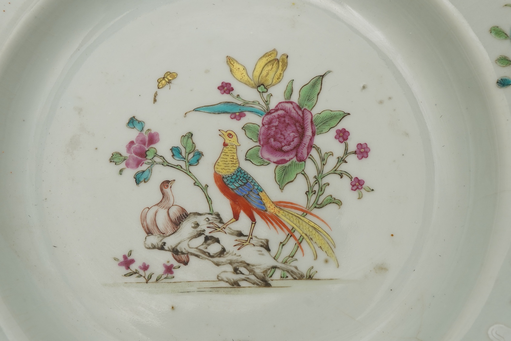 A pair of Chinese famille armorial plates, Qianlong, c.1750
